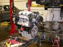 51_Chevrolet_minivan_rebuilt_V6_engine_on_workbench