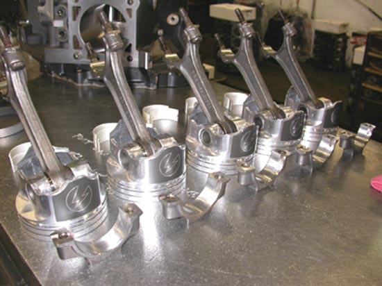172_high_performance_V8_engine_pistons_rods_before_assembly